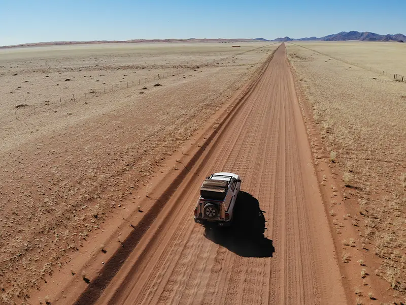 Drone Shot 4×4 Rental Car in Namibian Desert Drone Shot 4x4 Rental Car in Namibian Desert