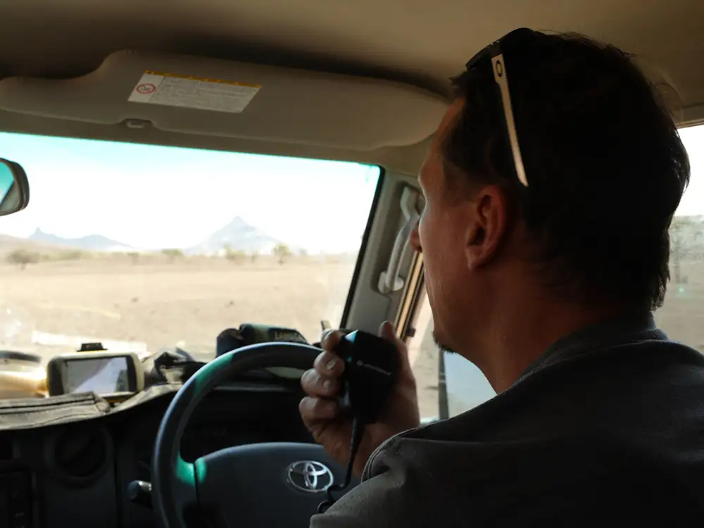 Guide Rainer Kriess driving 4×4 vehicle Guide Rainer Kriess driving 4x4 vehicle