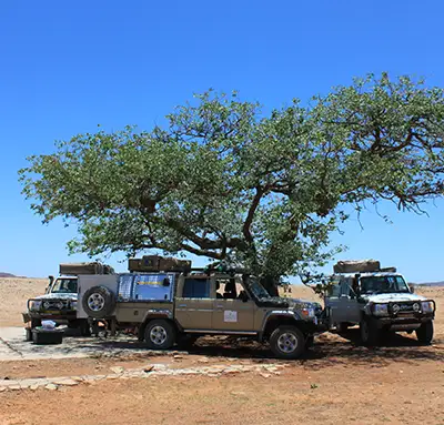 4×4 Cars in Convoy driving through the landscape of Namibia driving through the landscape of Namibia